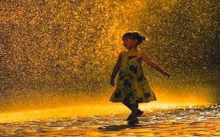 girl in rain shower image